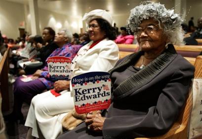 churchgoers with Kerry signs